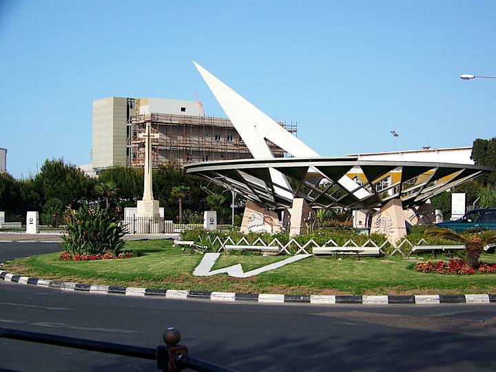 The Sundial Roundabout by day, its planted circle around a white sculptural sundial.